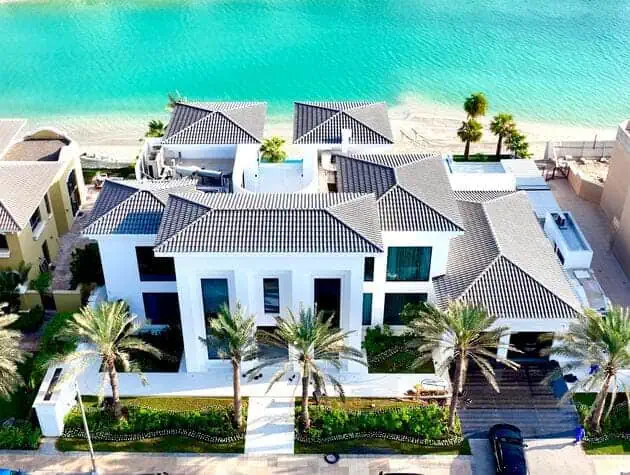 A stunning luxury villa in Dubai, complete with a private beach. Experience ultimate relaxation and indulgence in this exquisite retreat.