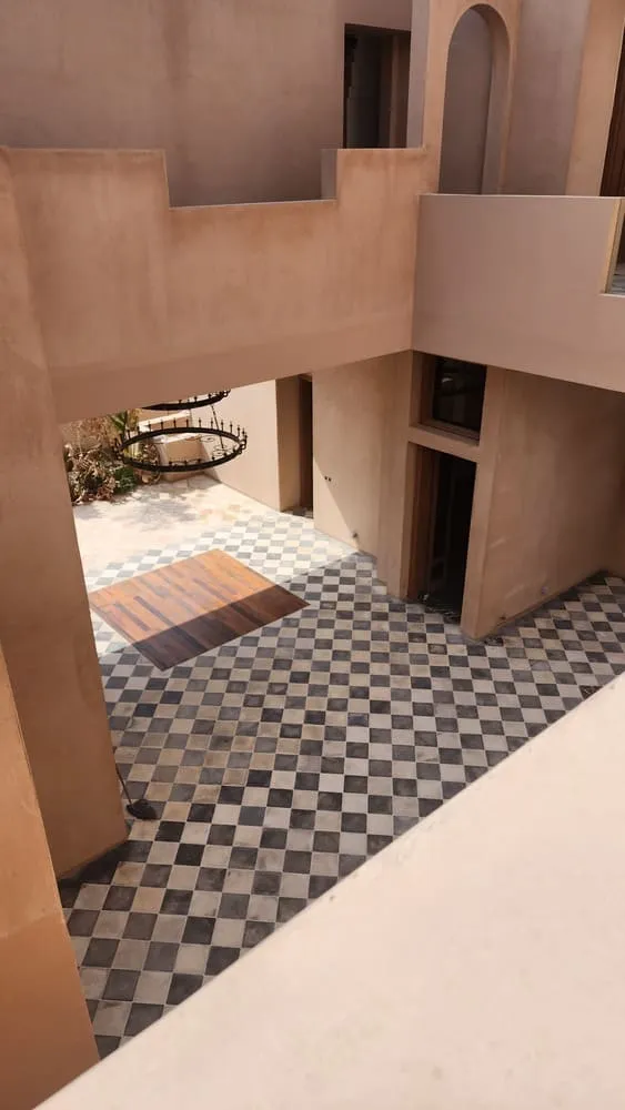a building with a black and white checkered floor